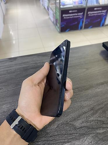 poco m5c: Смартфон Apple iPhone (серия с Dynamic Island) в черном цвете — 4