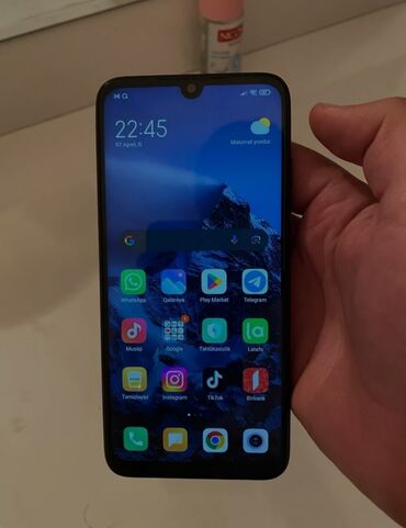 not 7: Xiaomi Redmi 7, 64 GB, rəng - Qara, 
 Barmaq izi, Face ID