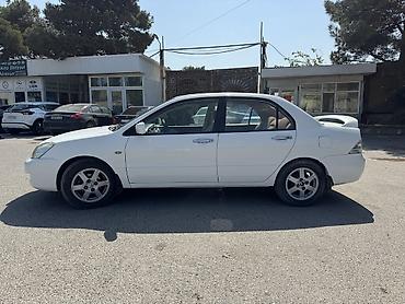 misin: Mitsubishi Lancer: 1.6 l | 2007 il 313000 km Sedan — 4