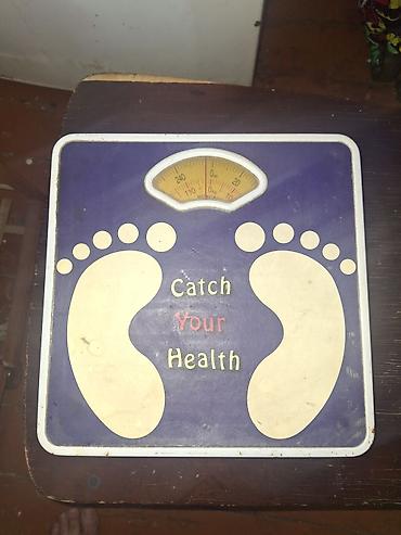 tərəzi qizil: Mexaniki bədən çəkisi tərəzisi - Üst paneldə “Catch Your Health” — 1