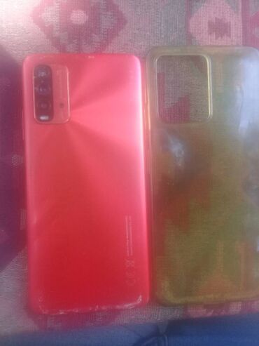 телефон fly ff159: Xiaomi Redmi 9T, 64 ГБ, цвет - Оранжевый, 
 Сенсорный, Отпечаток пальца, Две SIM карты