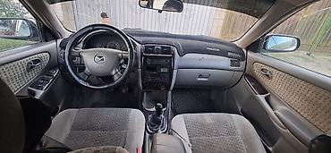 помпа на мазду: Mazda 626: 1999 г., 2 л, Механика, Бензин, Седан — 7