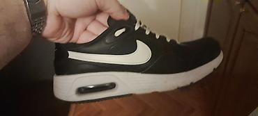 din 900: Muške patike Nike Air – crno‑bele - Model sa vidljivim Air jastukom u — 1