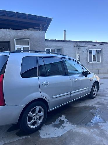 саната желтый: Mazda PREMACY: 2004 г., 1.8 л, Механика, Бензин, Универсал — 9
