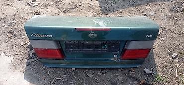альмера классик: Крышка багажника Nissan Almera класик Н 15 (надписи Almera, GX). Цвет — 4