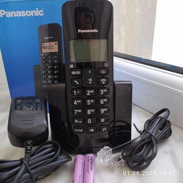 tap az telefonlar: Stasionar telefon Panasonic, Simsiz, Yeni, Ünvandan götürmə