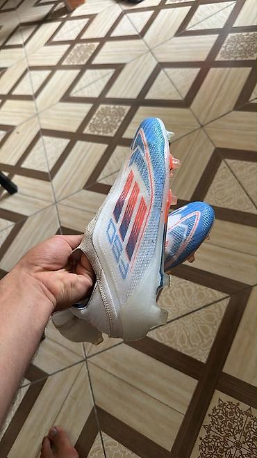 idman qanteli: F50 Məhsul: Futbol butsası (qazon üçün dişli) Model: Adidas X — 1