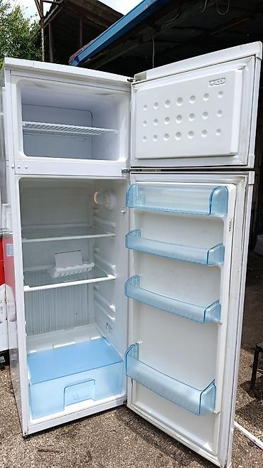 soyducu beko: Beko iki qapılı soyuducu - Üst hissədə dondurucu bölmə, metal rəf ilə — 2