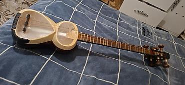 elektro gitara satisi: Tar – milli simli musiqi aləti - Korpus: armud formalı iki kameralı — 1