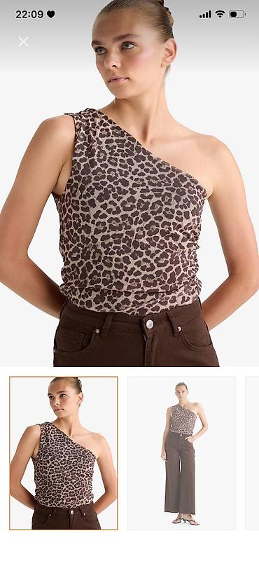 don modeleri: Brend: DeFacto Woman Model: birqollu, assimmetrik kəsimli bluz Ölçü — 4