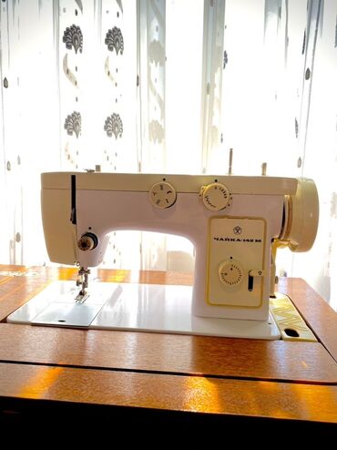 termos caydan: Tikiş maşını Chayka, Elektromexaniki, Ünvandan götürmə