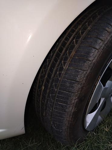 santafe 2010: Chevrolet Aveo: 1.4 l | 2010 il 263000 km Sedan — 6