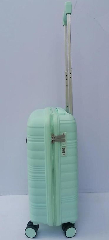 Putni koferi i torbe: Tvrdi kofer na točkiće – mint zelena boja - Kompaktna veličina — 9