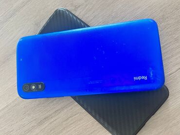telefon flai e 154: Xiaomi Redmi 9A, 32 ГБ, цвет - Синий, 
 Сенсорный, Две SIM карты, С документами