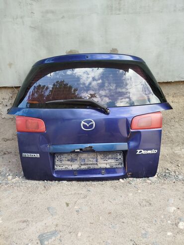 mazda 326: Крышка багажника Mazda 2003 г., Б/у, цвет - Синий,Оригинал