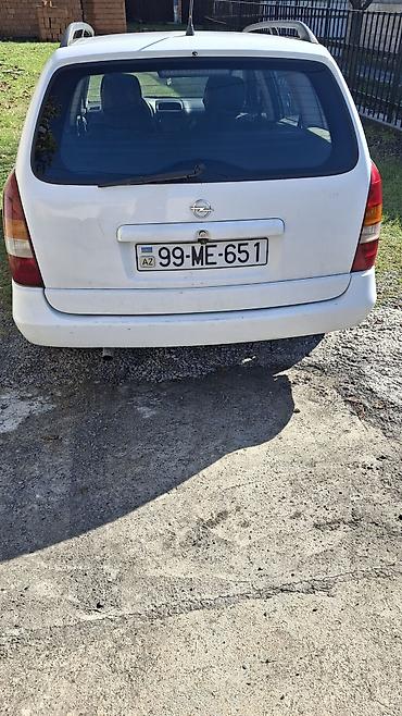 avtomobil kreditlə: Opel Astra Caravan (Universal) – ağ rəngdə, 5 qapı Mühərrik və — 7