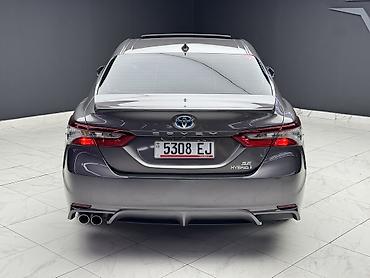 рейка камри: Toyota Camry: 2021 г., 2.5 л, Вариатор, Гибрид, Седан — 5