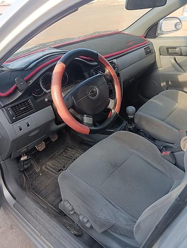 Chevrolet Lacetti: 2008 г., 1.4 л, Кол менен иштөөчү, Бензин, Седан — 5