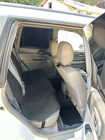 e klass: Subaru Forester: 2002 г., Универсал — 10