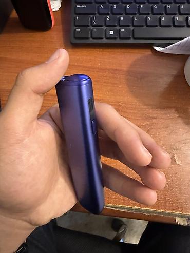 iqos 3 multi: IQOS tipli elektron tütün qızdırıcı cihazı. Şəkillərdə göründüyü kimi — 1