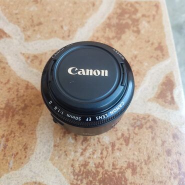 блок питания для ноутбука apple: Объектив Canon 50mm