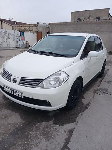 4 ayaq: Nissan Tiida: 1.6 l | 2006 il Sedan — 7