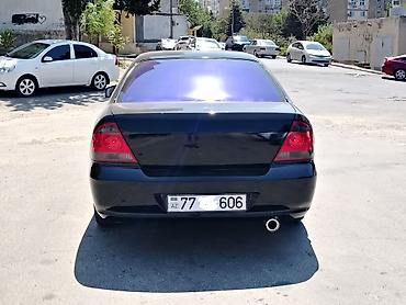 Транспорт: Nissan Sunny: 1.6 л | 2008 г. Седан — 4