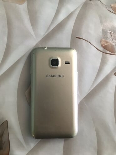 j1 mini: Samsung Galaxy J1 Mini | 8 GB | rəng - Qızılı | İki sim kartlı