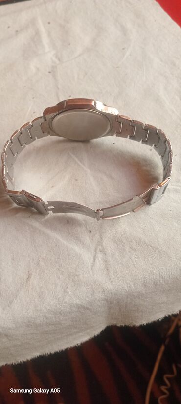 Qol saatları: Metal qolbaqlı kişi saatı - Korpus və qolbaq: paslanmayan polad — 10