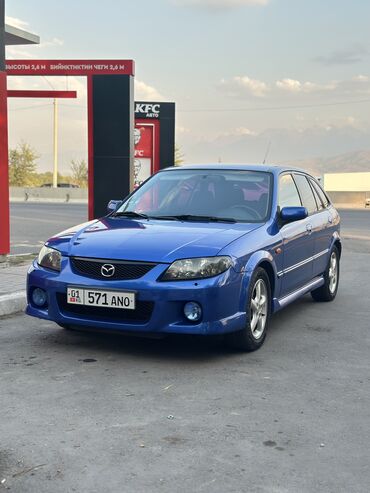 хово машина: Mazda 323: 2004 г., 2 л, Механика, Бензин, Хетчбек