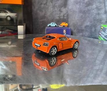 Avtomobil modelləri: Коллекционная модель Opel Speedster orange 2000 DeAgostini Art  — 6