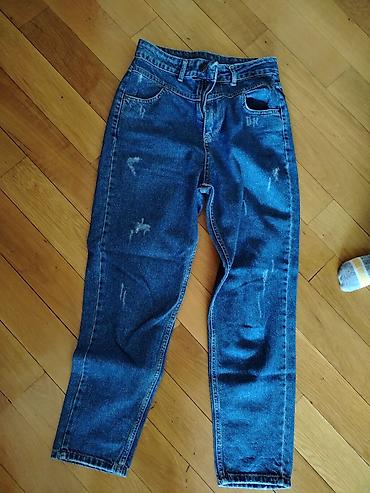 Cinslər: Mavi denim cins şalvar - Stil: Klassik düz kəsim, yüngül “distressed” — 1