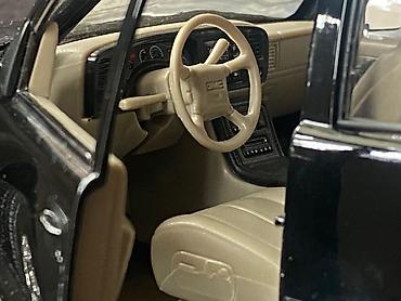 Avtomobil modelləri: Коллекционная модель GMC Yukon Denali black 2001 Welly Art  — 18