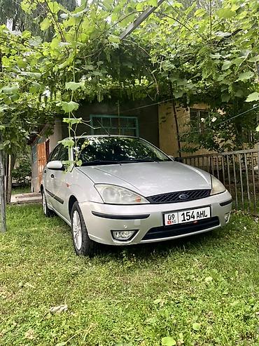 Ford Focus: 2004 г., 1.4 л, Кол менен иштөөчү, Бензин, Хетчбек — 1