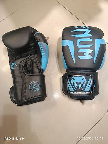 Venum boks əlcəkləri – 10 oz - Rəng: qara-mavi - Material: sintetik lalafo.az -da Venum boks əlcəkləri – 10 oz - Rəng: qara-mavi - Material: sintetik
