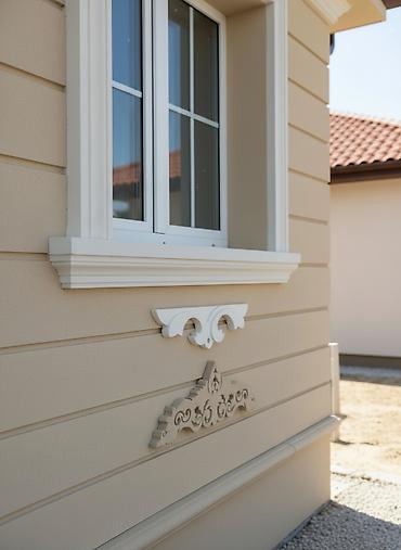 Dekorativ daşlar: Memarlıq dekorativ elementləri binanın fasadını bəzəmək üçün istifadə — 1