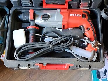 Ударная дрель RODEX в кейсе. Комплектация: - дрель с регулировкой
