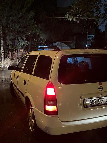 opel astra maşın: Opel Astra Caravan (ağ), universal kuzov - Geniş yük və sərnişin — 4