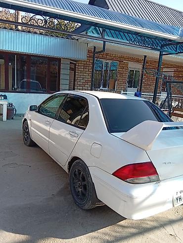 Mitsubishi Lancer: 2002 г., 1.5 л, Автомат, Бензин, Седан — 5