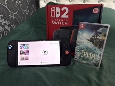 телефона купить: Nintendo Switch 2 + картридж The Legend of Zelda: Tears of the Kingdom