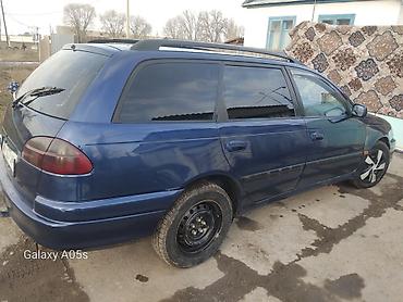 Другие автомобили: Просторный универсал синего цвета. Основные особенности: - Кузов — 3