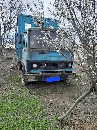 фургоны категории б: Yük maşını – 6x4 təkər formulu, mavi rəngli bortlu/karkaslı yük kuzovu — 9