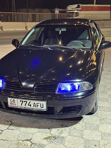 диска на авто: Mitsubishi Carisma: 2003 г., 1.8 л, Автомат, Бензин, Лифтбек — 1