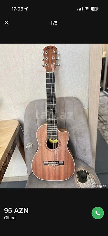 Akustik gitara – Tayste - Korpus: tünd ağac teksturalı, kəsik lalafo.az -da Akustik gitara – Tayste - Korpus: tünd ağac teksturalı, kəsik
