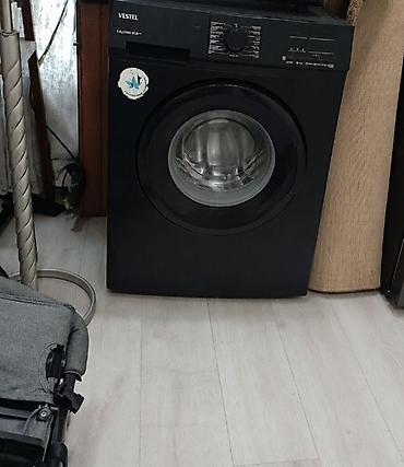 Vestel paltaryuyan maşın – ön yükləməli, qara korpus. - Model