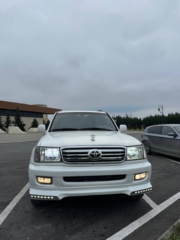 Toyota: Toyota Land Cruiser 2002 – baxımlı, əziyyət görməyib. Ağ rəngdədir — 3