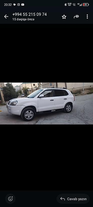 corolla 2006: Hyundai Tucson – ağ rəngli, şəhər və kənd yolları üçün universal — 1