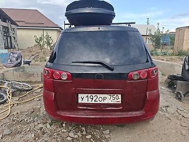 range over: Mazda Demio: 2002 г., 1.3 л, Бензин — 1