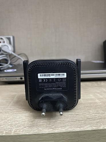 routur: Xiaomi Mi Wi‑Fi Range Extender Pro siqnal gücləndiricisi. İlk öncə — 3