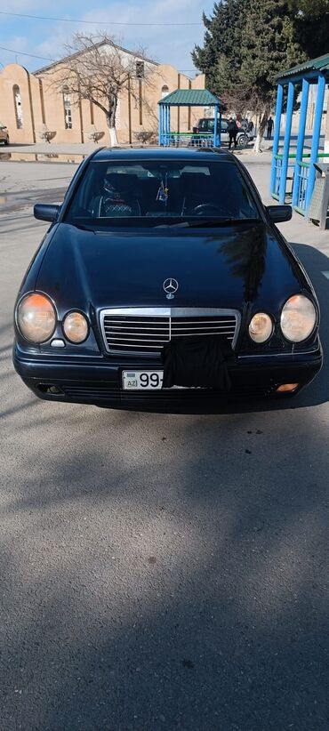 Mercedes-Benz: Mercedes-Benz 240: 2.4 l | 1997 il Sedan